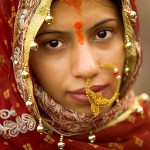 090129_varanasi_uttar_pradesh_india_bride_woman_beautiful_portrait_ghat_wedding_nosering_veil_innocent_lost_travel_photography